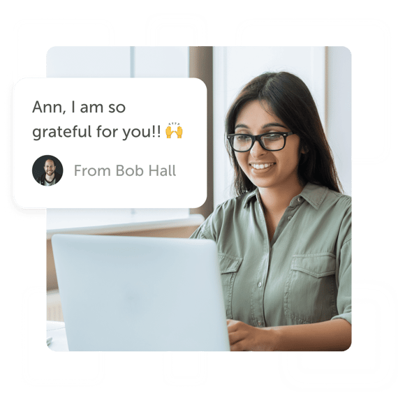 Woman looking at laptop and a "grateful for you" Kudoboard post