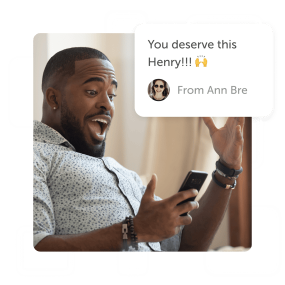 Excited man looking at phone with a "You deserve this" post