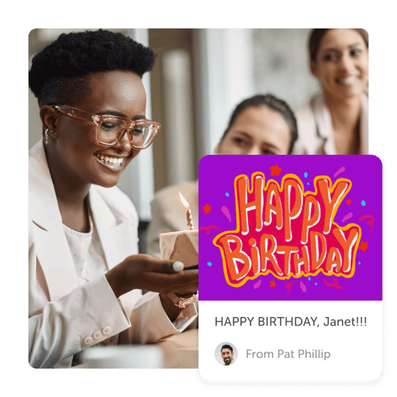 Woman smiling with cake and "Happy Birthday" Kudoboard post