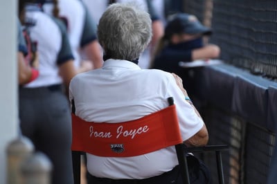 Joan Joyce sitting in director's chair