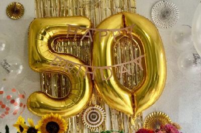 50th birthday balloons in party display