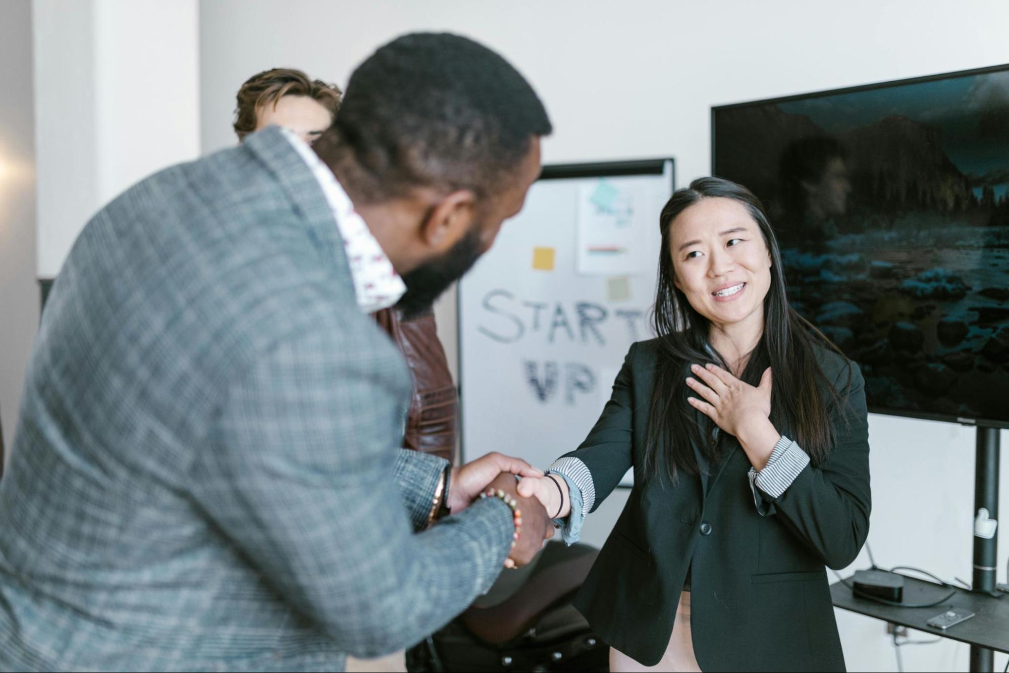 Employee receiving recognition from an admin