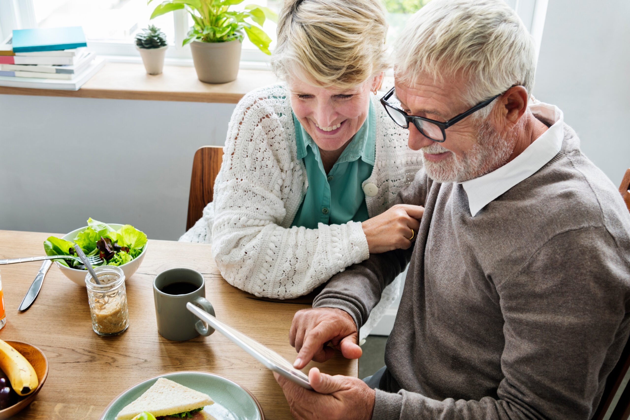 Retirees viewing a retirement group card