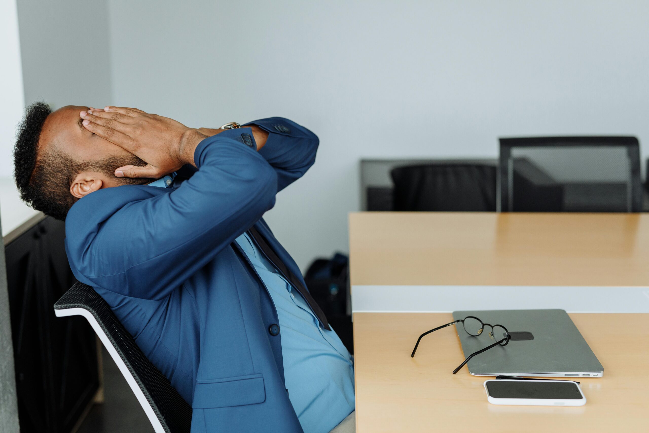 a man stressed at work around the holidays